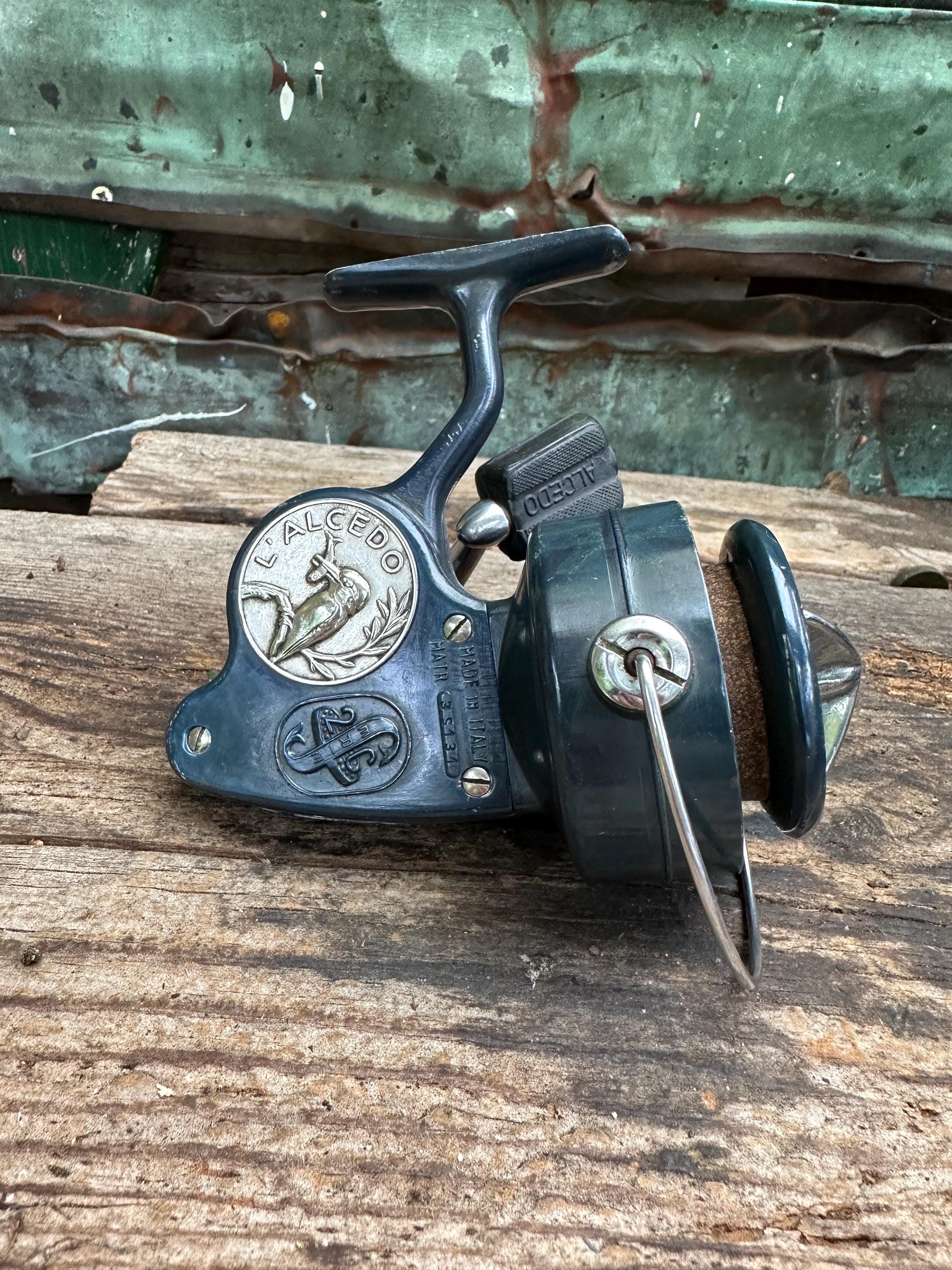 bass fishing reels south africa One Rod Reel Combo, 2-Piece Fishing Pole with Spinning Reel Super Polymer Handle Rod-Green -1.98M Sports & Outdoors Clam 12044 The MACK Match Fishing Model:BLACK LABEL 641MHFB
