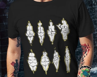 May include: Black t-shirt with a graphic of nine white figures in various poses, outlined in gold. The figures are all different shapes and sizes, representing body positivity.