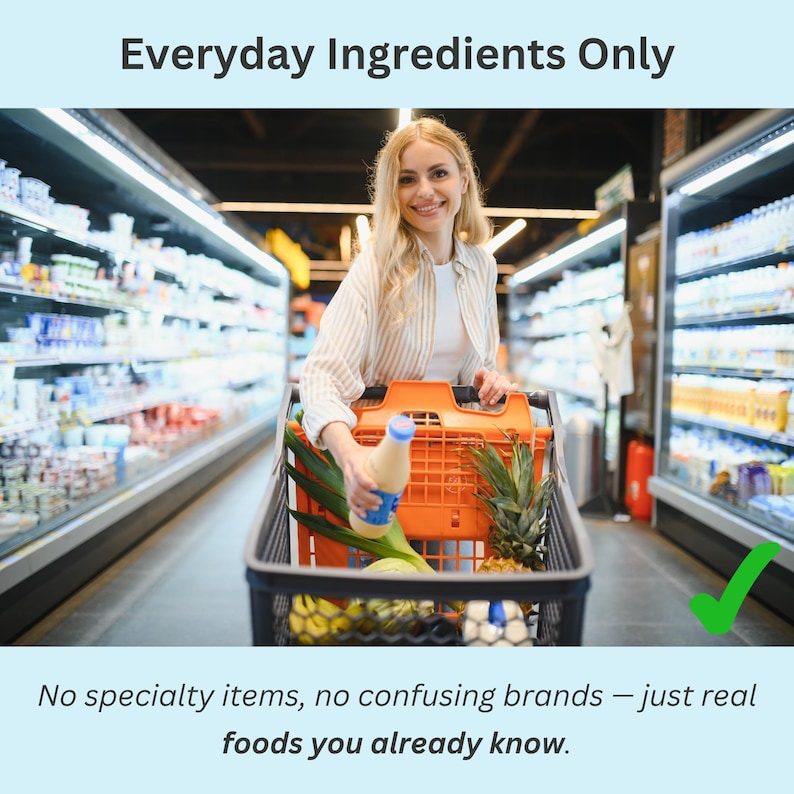 Smiling woman grocery shopping with a full cart of produce, representing how the low sodium grocery list features only real, everyday foods.