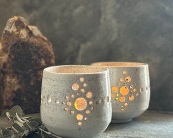 Starburst luminaries, speckled stoneware, off-white, sloping teardrop profile. Free shipping! Handmade on pottery wheel, 3.75”