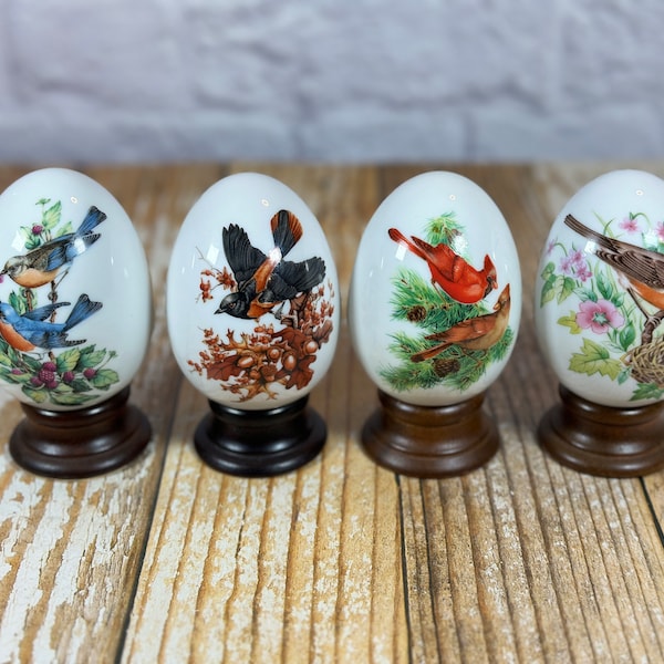 Vintage 1970s collectible Avon porcelain eggs with seasonal bird images and messages