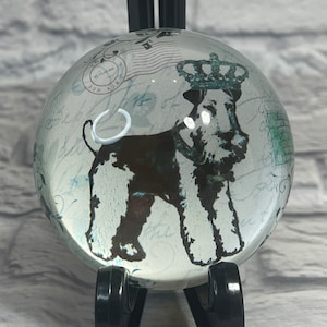 Vintage Carte Postale round glass paperweight with terrier and crown image