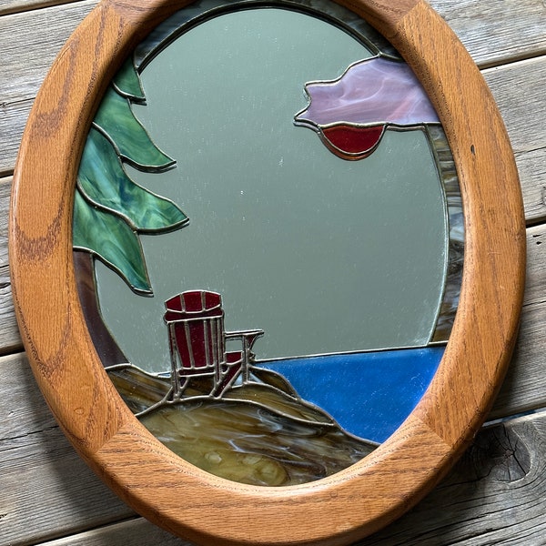 Framed oval mirror with stained glass cottage by the lake scene