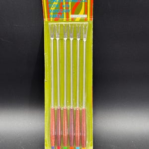 Vintage set of six stainless steel fondue or BBQ forks with mahogany handles