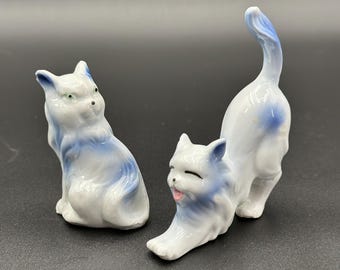 Vintage ceramic cat figurines with white and blue colours