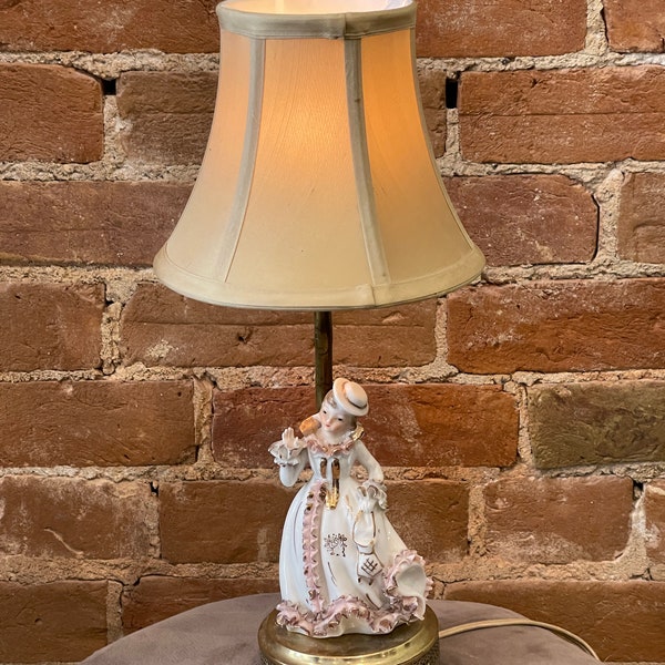 Antique porcelain figure lamp with shade