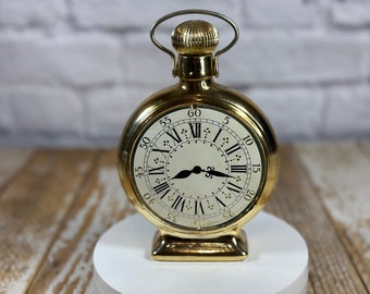 Reloj de bolsillo Vintage Avon en forma de botella de loción picante para después del afeitado 6 onzas líquidas
