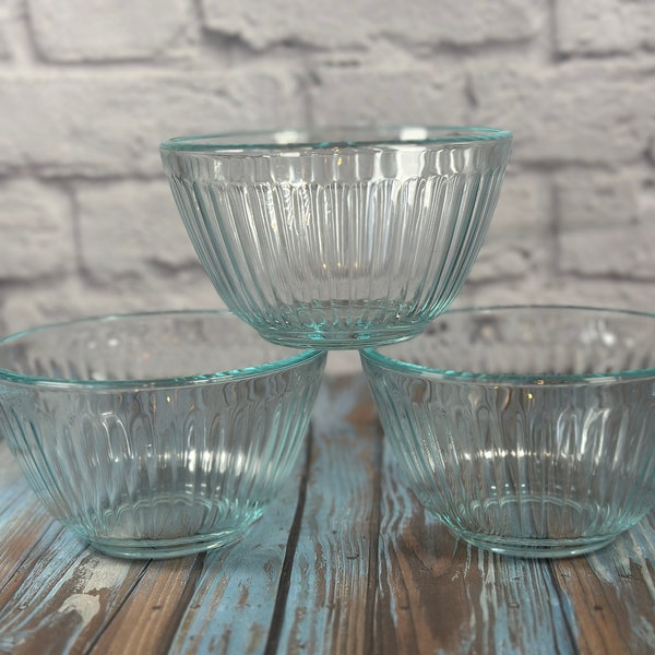 Set of three clear blue ribbed Pyrex mixing bowls from the 1990s