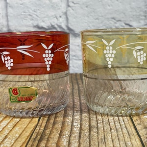 Set of two Vintage Made in Italy Spa Lubiana red and yellow drinking glasses with grape design