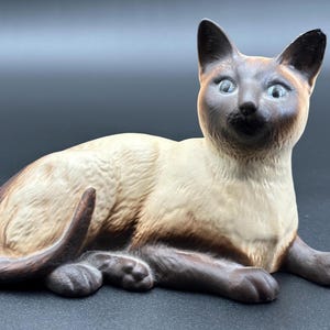 Vintage Beswick reclining ceramic Siamese cat figurine