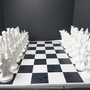 Unpainted Ceramic Bisque, Battle of the Ages Chess Set