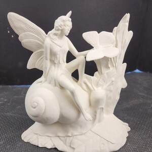 Unpainted Ceramic Bisque, Fairy on Snail, 9"tall/8"wide