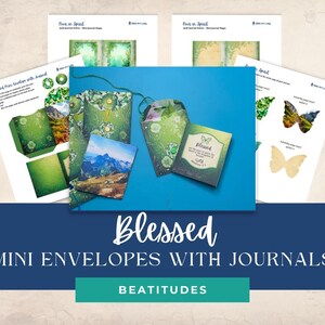 May include: A collection of mini envelopes and journals with a blue background. The envelopes are green with floral designs, and the journals feature mountain landscapes and butterfly illustrations. The text on the image reads "Blessed Mini Envelopes with Journals" and "Beatitudes."