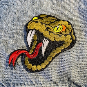 Schlangenkopf Aufnäher