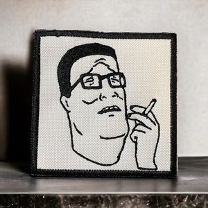 Hank Hill Smoking Patch - King of the Hill - patches voor jassen, truien, tassen, hoeden - Cartoon - televisie - grappig