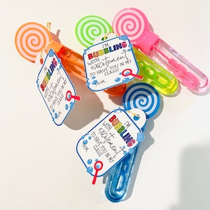 May include: Three colorful bubble wands with tags that read "I'm bubbling with excitement to have you in my class!"  The tags are decorated with colorful bubbles and swirls.