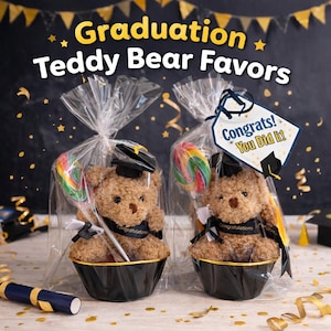 May include: Two graduation teddy bear favors in clear cellophane bags. Each bear wears a graduation cap and a sash that says "Congratulations". Each favor includes a colorful lollipop and sits in a black cupcake liner. The tag says "Congrats! You Did It!"