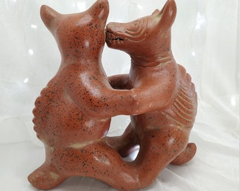 Archaeological replica of Tlalchichis dogs (Xoloitzcuintle) clay dance. Pre-Colombian. Handmade sculpture in Mexico.rs