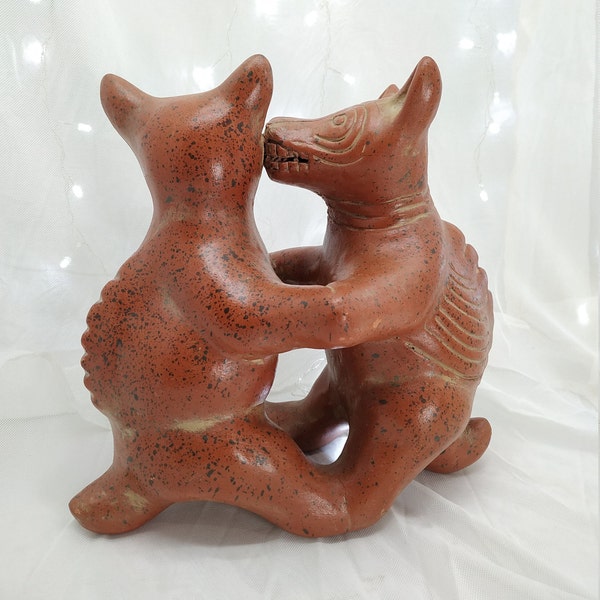 Archaeological replica of Tlalchichis dogs (Xoloitzcuintle) clay dance. Pre-Colombian. Handmade sculpture in Mexico.rs