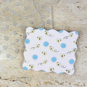 Timbro con texture ape e fiore – Motivo per timbro in fondente acrilico