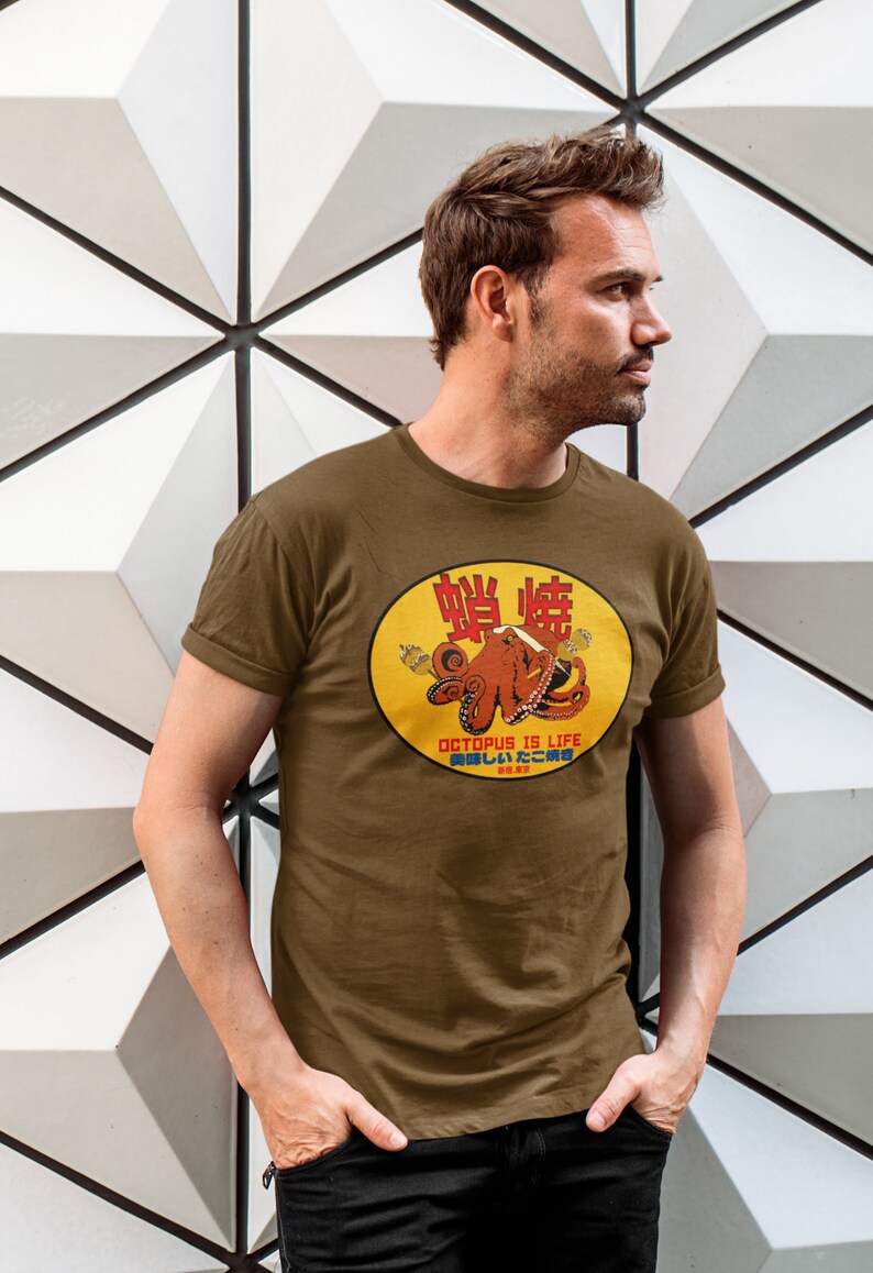 May include: A brown t-shirt with a yellow circle graphic featuring an octopus with the text "Octopus is Life" and Japanese characters.
