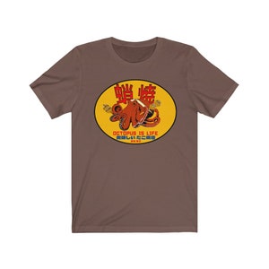 May include: A brown t-shirt with a yellow circle graphic featuring a red octopus with the text "Octopus is Life" and Japanese characters.