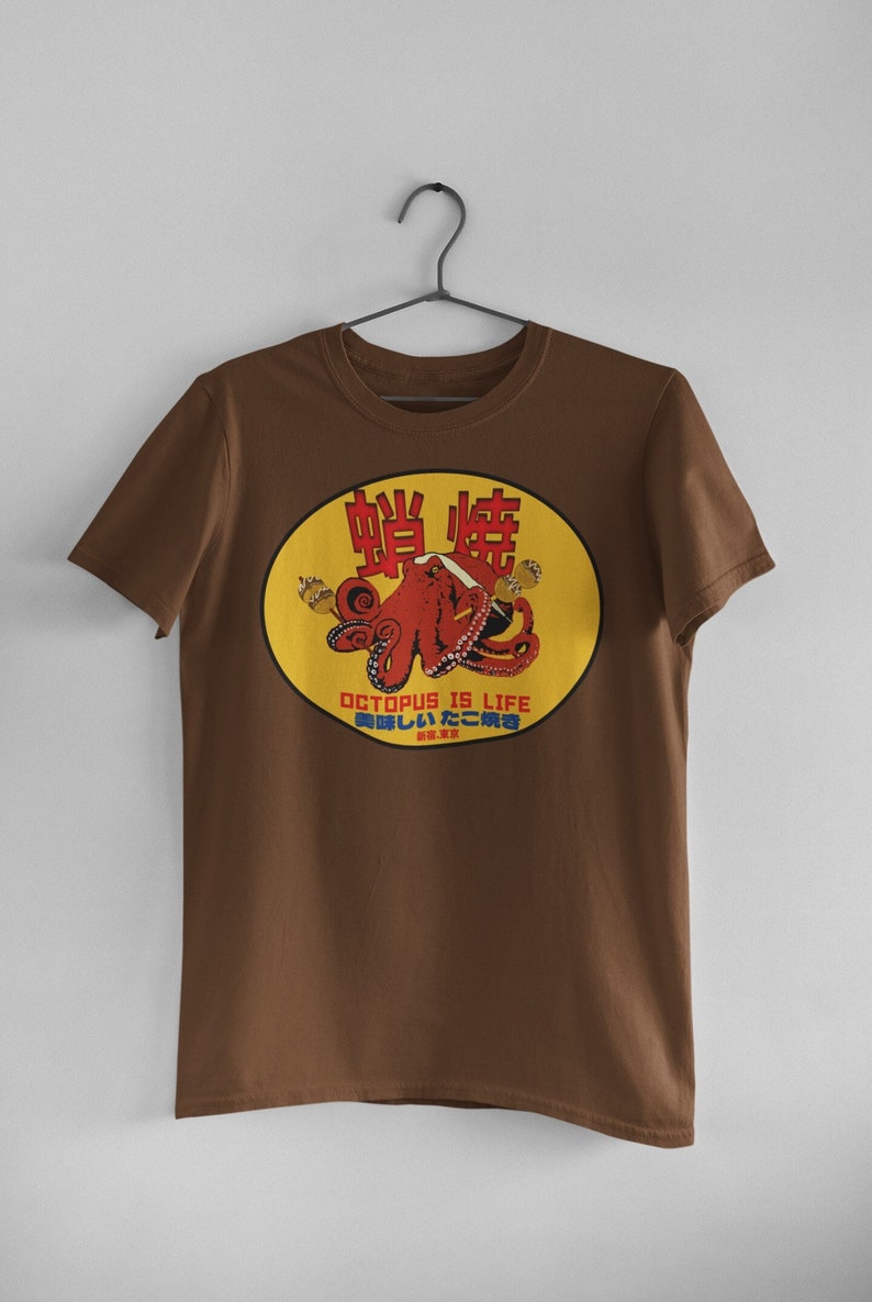May include: Brown t-shirt with a yellow circle graphic featuring a red octopus with the text "Octopus is Life" and Japanese characters.