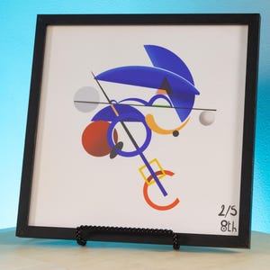 May include: A square framed print featuring a white background with abstract geometric shapes in blue, orange, red, and grey. The composition includes circles, lines, and a square. The bottom right corner displays the handwritten text 2/5 8th.