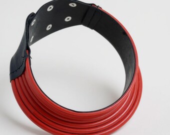 Red “Rings” choker necklace – 6 cm wide, contemporary African style, adjustable with snap fasteners, comfortable faux leather lining