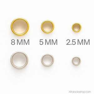 May include: A collection of gold and silver-colored metal rings in varying sizes, displayed against a white background. The rings are labeled with their sizes: 8 MM, 5 MM, and 2.5 MM. The gold rings have a shiny finish, while the silver rings have a matte finish.