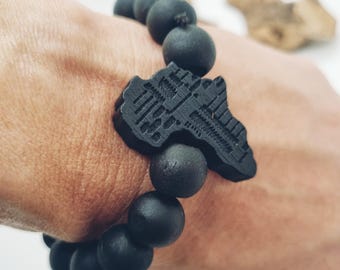 Wooden Africa bracelet – round beads & continent medal – unisex, 3 colors, elastic – Afro/ethnic style, ideal gift