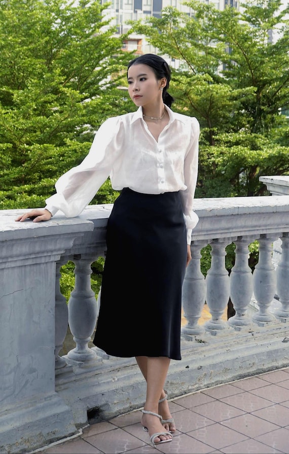 Ensemble Letitia, chemisier transparent à manches bouffantes blanc