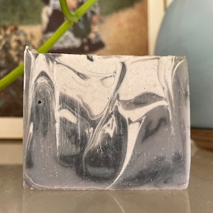 North Woods                           Essential oils are Pine, Cedarwood, Peppermint, orange. Charcoal, indigo powder, and zinc oxide.