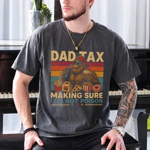 Bigfoot Dad Tax Graphic T-Shirt humorous dad apparel for camping and adventure lovers