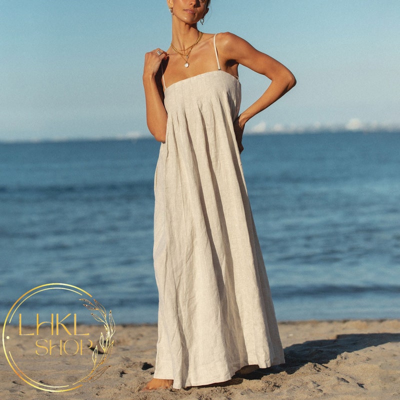 santiago cut out ruffle maxi dress blush Cut-Out Ice Blue – Lucy In The Dream Back Style_Criss Cross Low Back Color:PEACH Women's Latex Dresses –