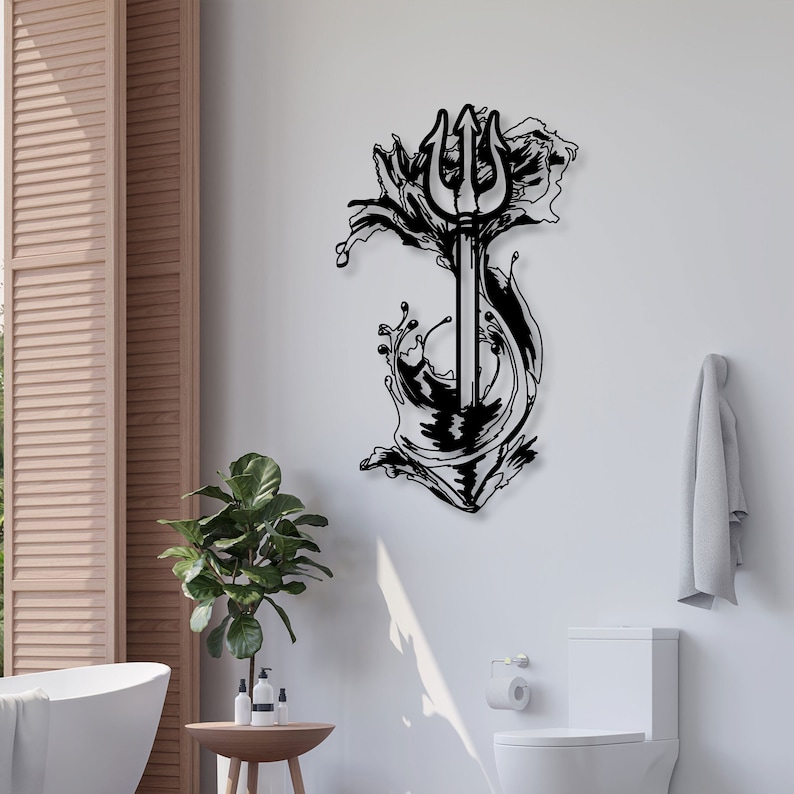 May include: Black metal wall art depicting a trident with waves crashing around it. The trident is a symbol of power and strength, while the waves represent the ocean.