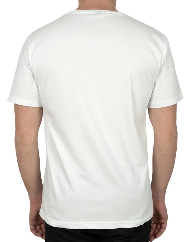 May include: A plain white short-sleeve t-shirt. The back of the shirt is visible, showing the neckline and the sleeves. The shirt is made of a soft, opaque fabric.