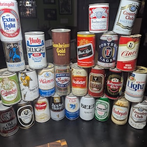 26 latas de cerveza vintage de los años 70 y 80