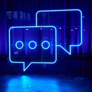 Trade fair stand LED neon signs I Stage design I Illuminated logo I Company sign I LED illuminated lettering I LED neon signs I Advertising outdoor advertising