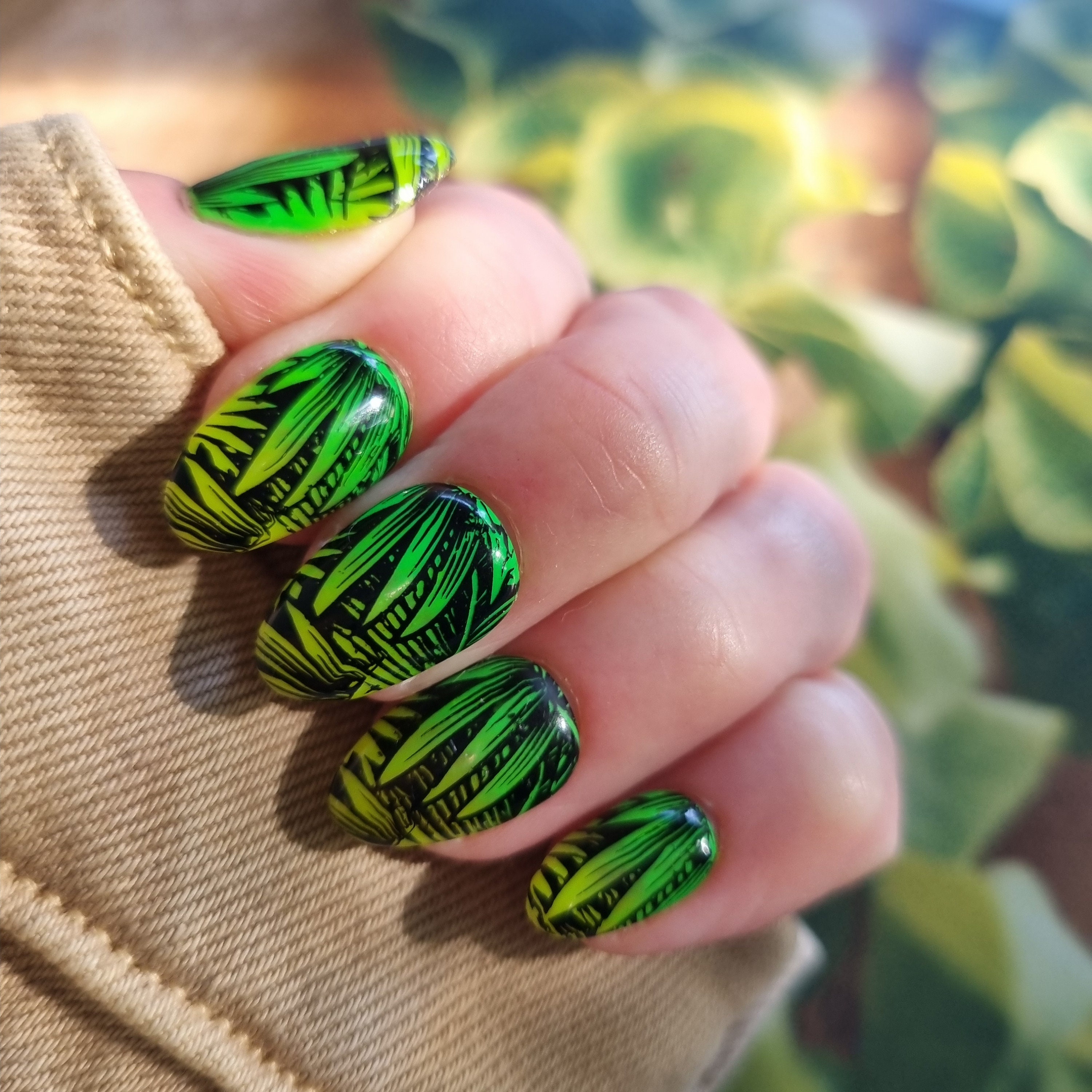 Chic Lopsided Green Stencil Nails