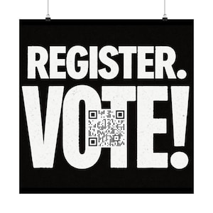 May include: A black square sign with white text that reads REGISTER. VOTE! The letter O in the word VOTE is replaced by a black and white square QR code. The sign is suspended by two small metal clips attached to the top edge of the black background.