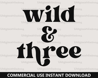 May include: Black and white graphic text that reads "wild & three".