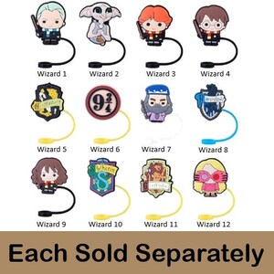 May include: Twelve colorful Harry Potter themed charms with a variety of designs, including the Hogwarts crest, the Hogwarts Express, and the Sorting Hat. Each charm is attached to a black, yellow, or blue string.