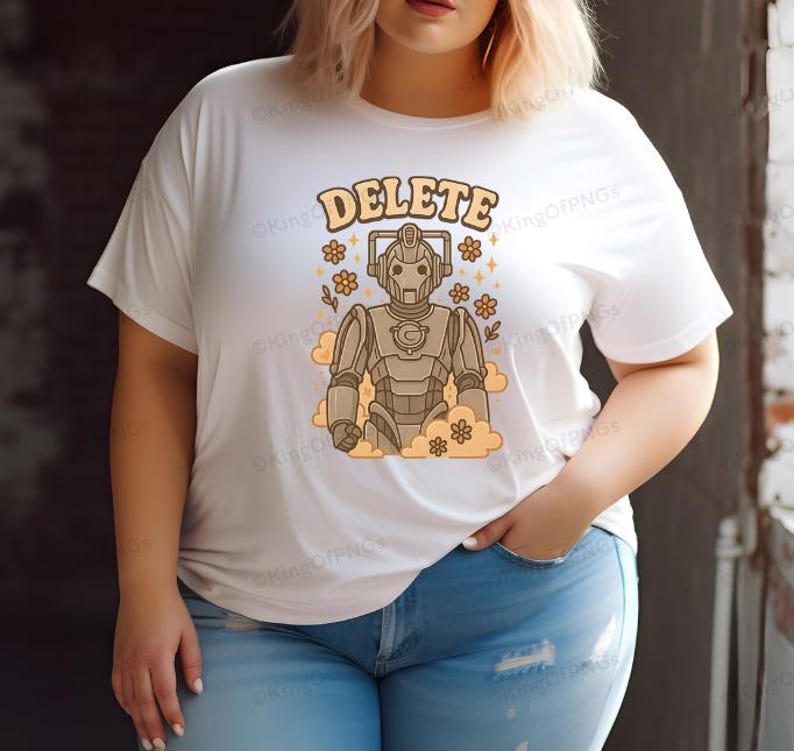 A woman wearing a white t-shirt with a graphic design of a robot character and the word "DELETE" printed on it.