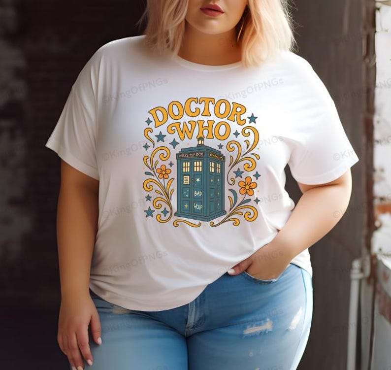 A woman wearing a white t-shirt with a graphic design featuring a blue telephone booth and the text "DOCTOR WHO" printed on it.