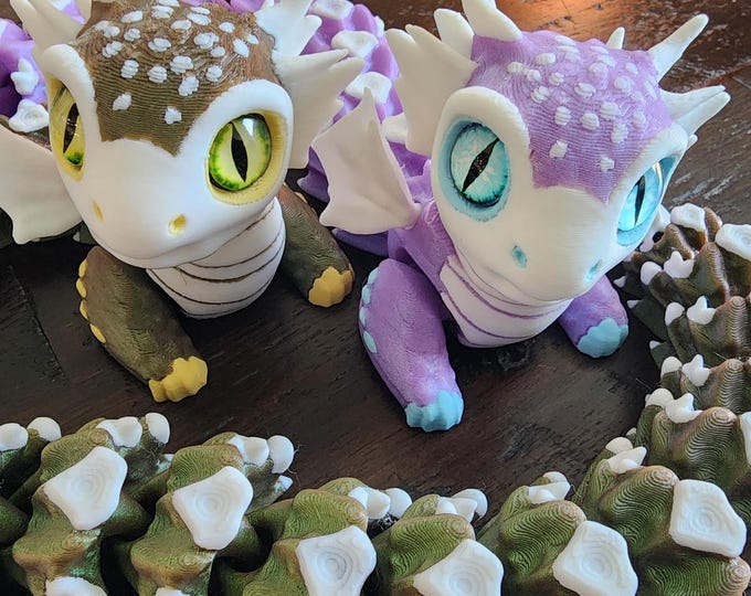 Serev3d Designed 3D printed Serpent dragons with craft eyes