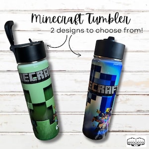 May include: Two stainless steel water bottles with a Minecraft theme. One bottle has a green and black design with the Minecraft logo. The other bottle has a blue and black design with the Minecraft logo.