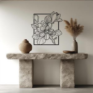 black floral wall hanging