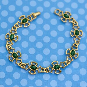 Avon top cross bracelet