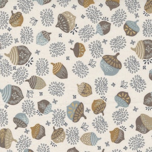May include: A seamless pattern featuring brown, blue and gold acorns with stylised floral designs on a cream background.